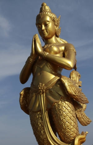 golden statue of a human divine being
